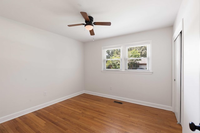 1417 Downing St, Charleston, SC 29407 - unfurnished bedroom featuring wood finished floors, a closet, and ceiling fan