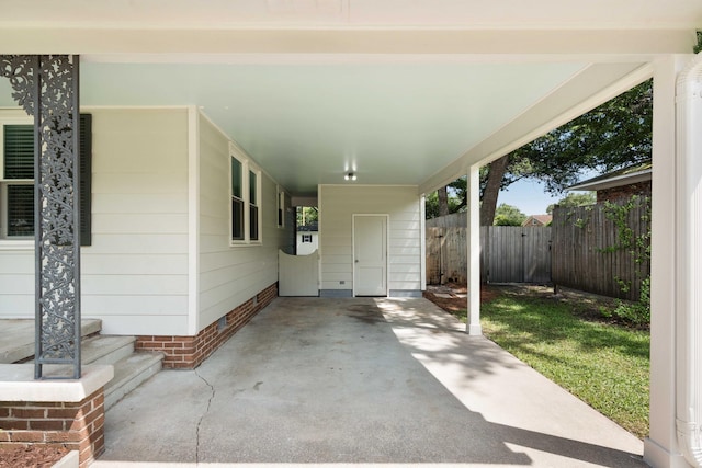 1417 Downing St, Charleston, SC 29407 - view of patio / terrace featuring an attached carport