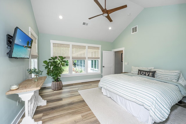 bedroom featuring wood finished floors, baseboards, recessed lighting, high vaulted ceiling, and a ceiling fan