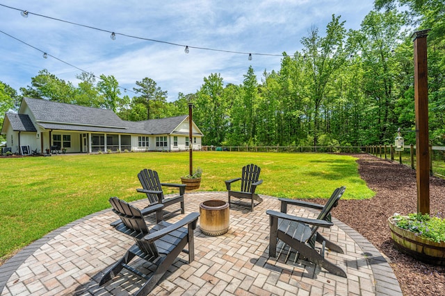 view of patio featuring an outdoor fire pit