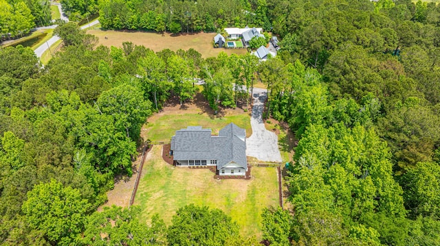 view from above of property featuring a forest