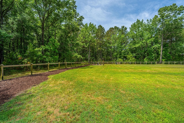view of yard featuring a view of trees