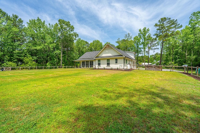 back of property featuring board and batten siding