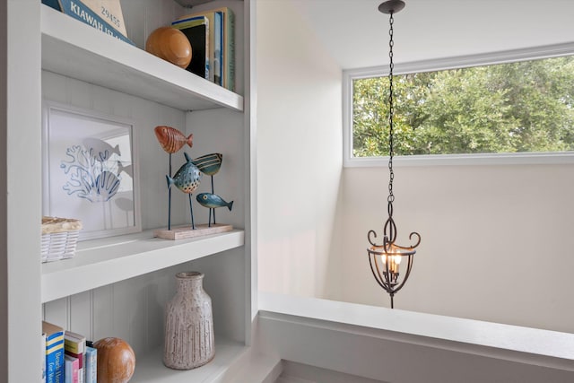 interior details with a chandelier