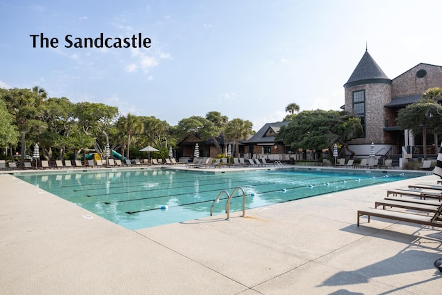 view of pool featuring a patio area