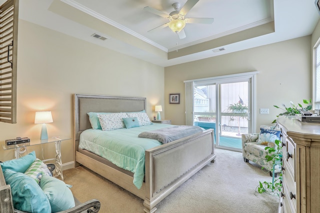 269 Village Stone Cir, Summerville, SC 29483 - bedroom featuring access to exterior, light colored carpet, crown molding, a raised ceiling, and multiple windows