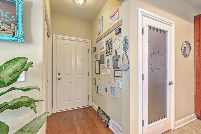 269 Village Stone Cir, Summerville, SC 29483 - doorway featuring baseboards and light wood finished floors