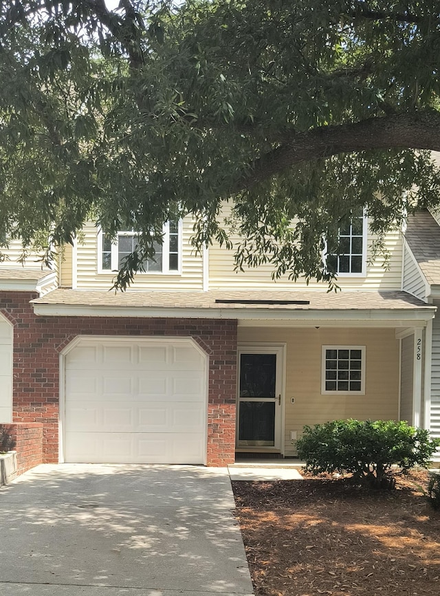 view of front of home with a garage