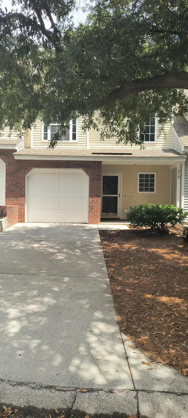 view of front of property with a garage