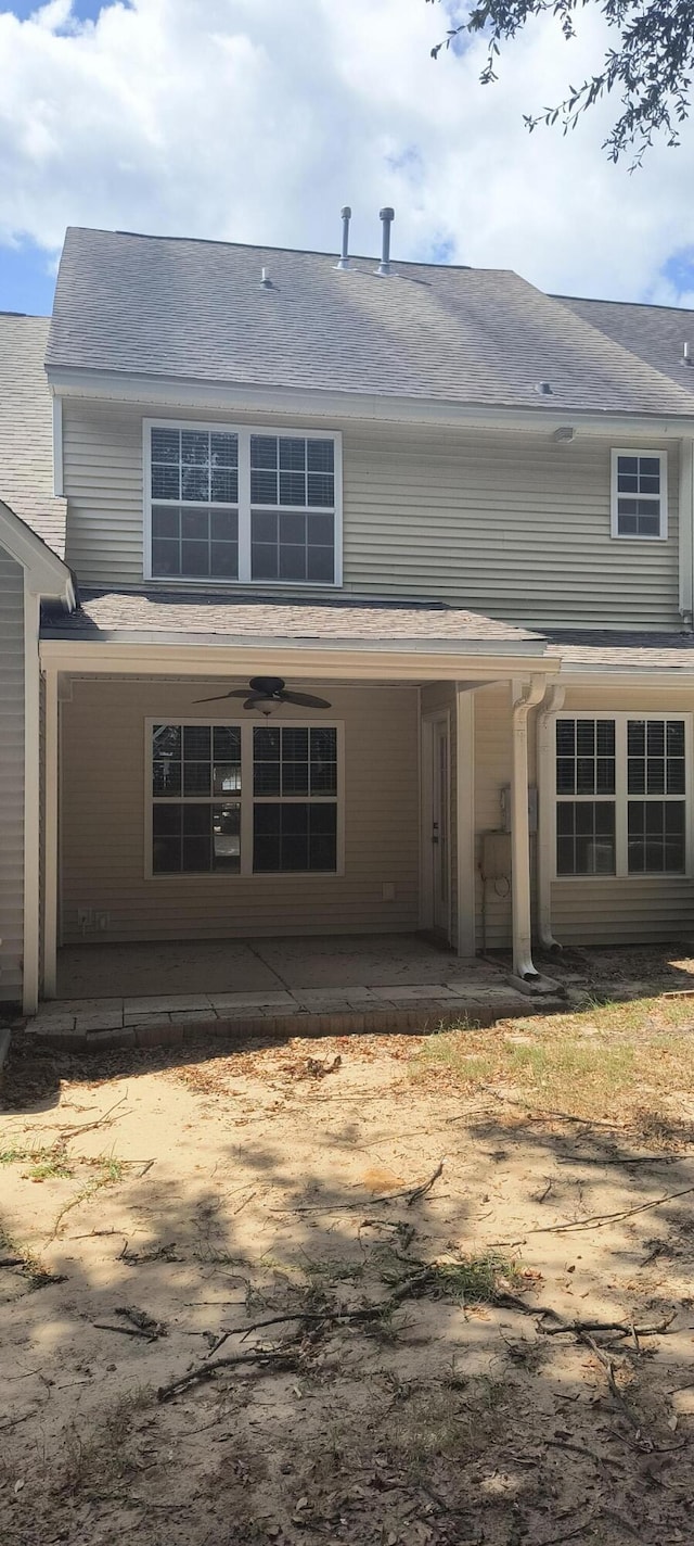 back of house featuring ceiling fan