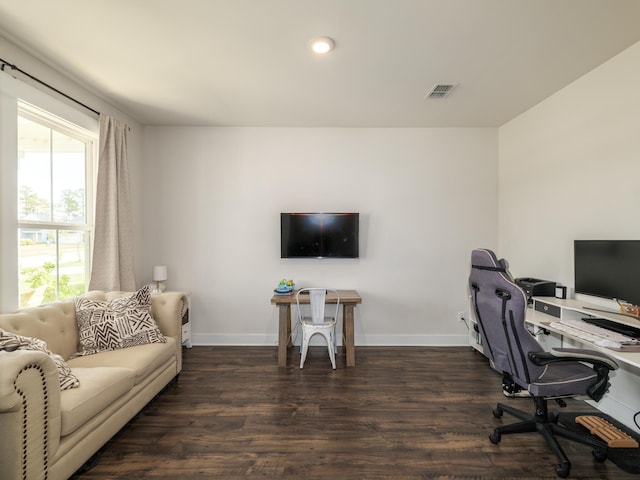 home office featuring dark hardwood / wood-style flooring