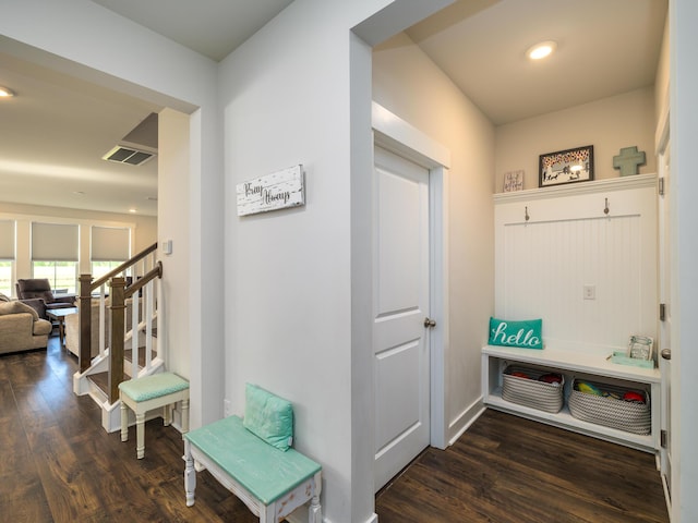 mudroom with dark hardwood / wood-style floors