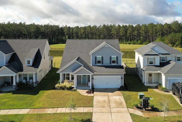 view of front facade with a garage and a front lawn