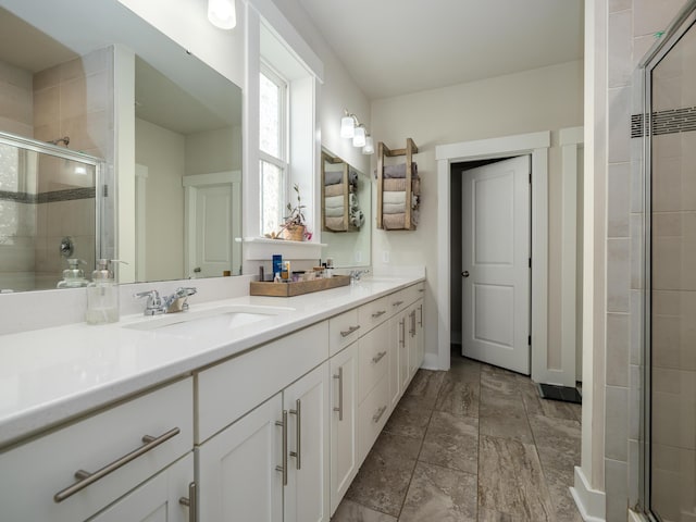 bathroom with vanity and an enclosed shower