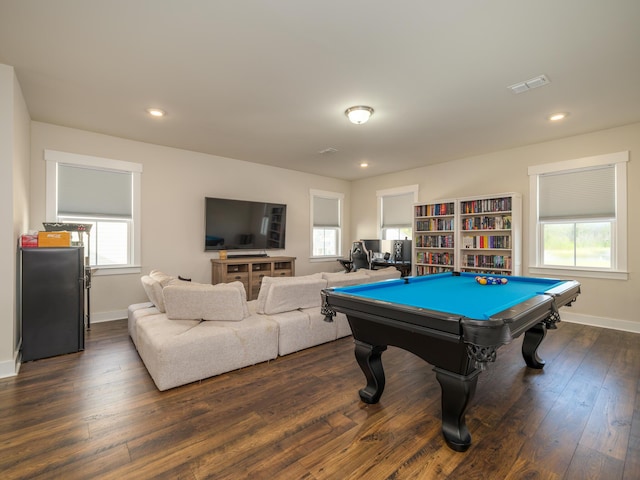 playroom with a healthy amount of sunlight, dark hardwood / wood-style floors, and pool table