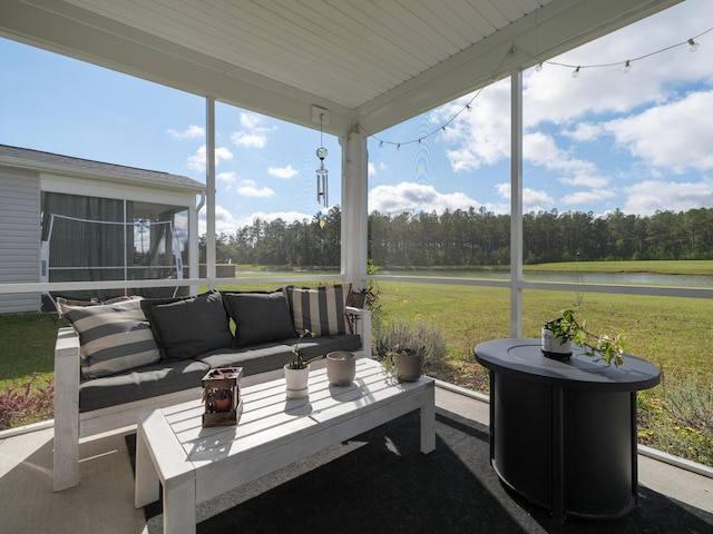 view of patio / terrace featuring an outdoor living space and a water view