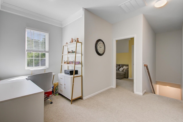 office space featuring baseboards, visible vents, light colored carpet, and ornamental molding