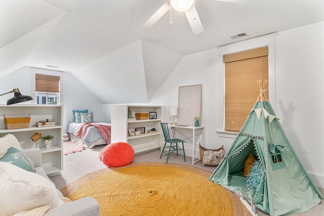 rec room featuring carpet flooring, vaulted ceiling, and ceiling fan