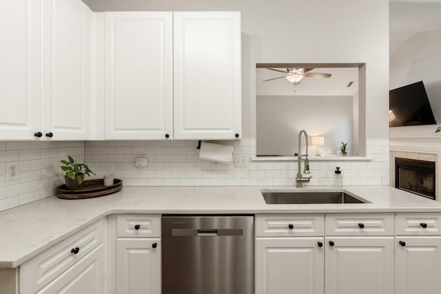 1971 N Smokerise Way, Mount Pleasant, SC 29466 - kitchen with decorative backsplash, ceiling fan, dishwasher, a sink, and white cabinetry