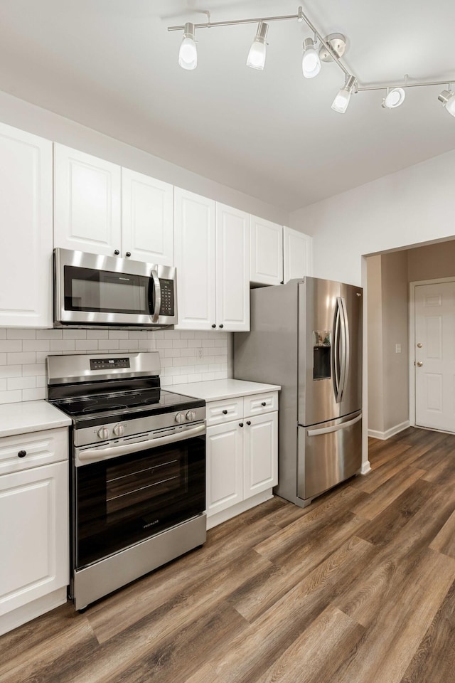 1971 N Smokerise Way, Mount Pleasant, SC 29466 - kitchen featuring light countertops, white cabinetry, appliances with stainless steel finishes, and tasteful backsplash