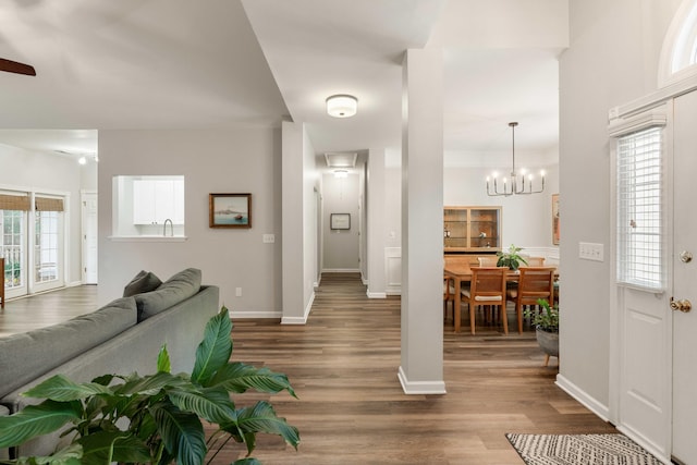 1971 N Smokerise Way, Mount Pleasant, SC 29466 - foyer featuring baseboards, wood finished floors, and ceiling fan with notable chandelier