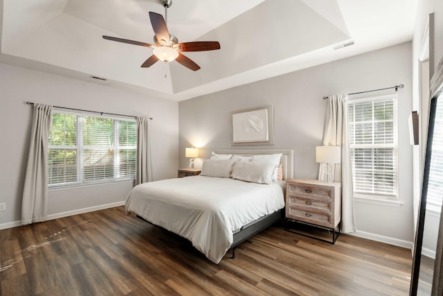 1971 N Smokerise Way, Mount Pleasant, SC 29466 - bedroom with baseboards, a tray ceiling, visible vents, and wood finished floors