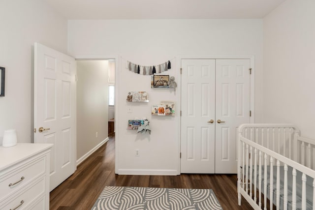 1971 N Smokerise Way, Mount Pleasant, SC 29466 - bedroom featuring a closet, dark wood-style flooring, baseboards, and a nursery area