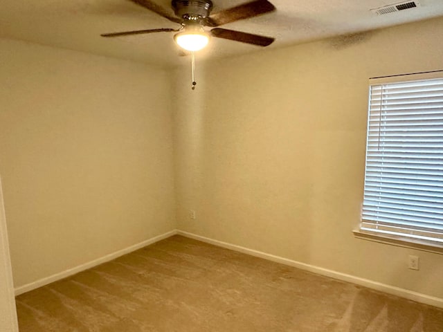 unfurnished room featuring ceiling fan