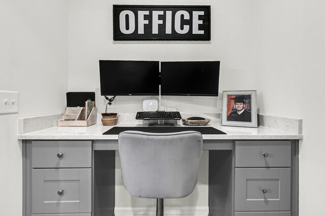 office area with built in desk