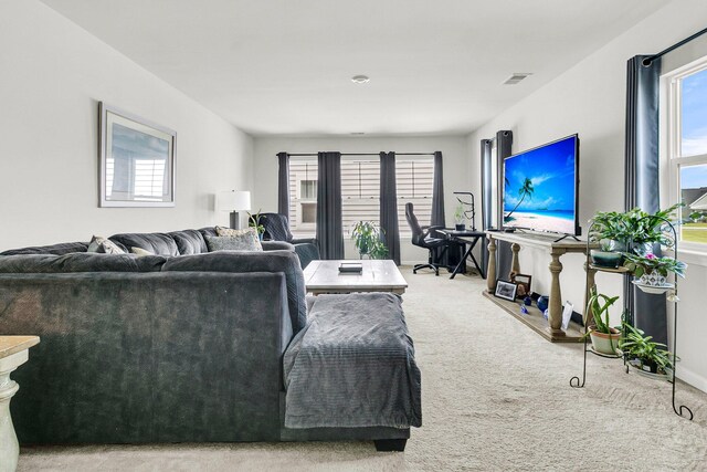 living room with light carpet