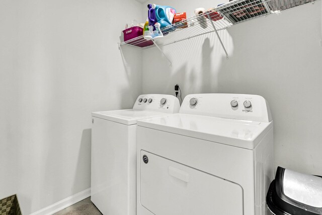 washroom with washer and dryer