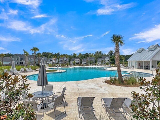 view of pool with a patio area