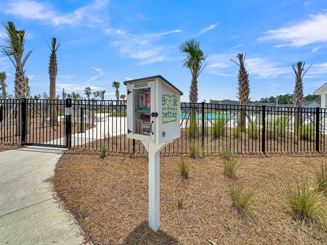 view of property's community with a pool