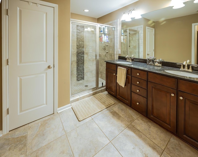 8009 Indian Hill Dr, Hanahan, SC 29410 - full bath featuring a sink, tile patterned flooring, a shower stall, and double vanity