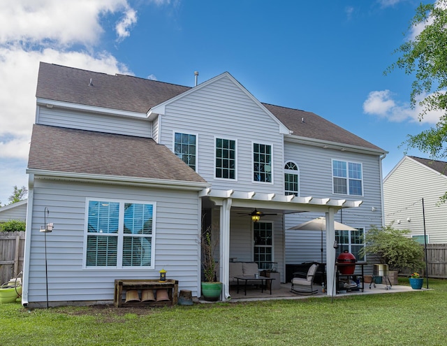 8009 Indian Hill Dr, Hanahan, SC 29410 - back of house featuring fence, roof with shingles, ceiling fan, a patio area, and a lawn