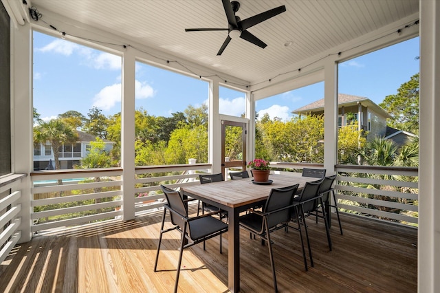 409 W Indian Ave, Folly Beach, SC 29439 - sunroom with outdoor dining space and a ceiling fan