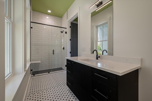 409 W Indian Ave, Folly Beach, SC 29439 - full bath with a stall shower, vanity, and recessed lighting