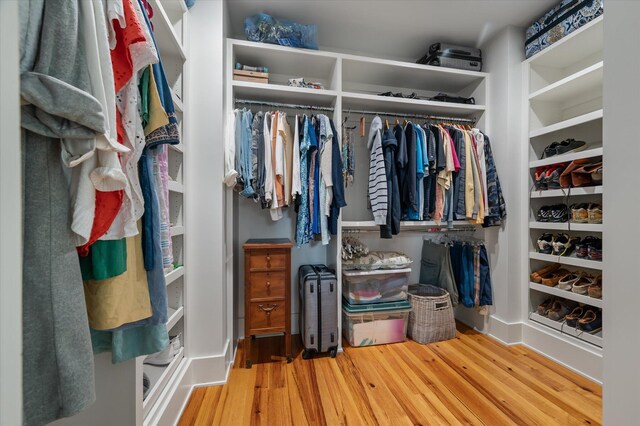 409 W Indian Ave, Folly Beach, SC 29439 - walk in closet with wood finished floors