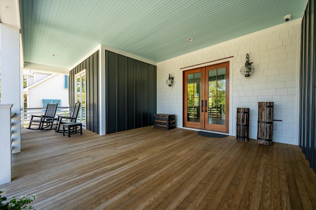 409 W Indian Ave, Folly Beach, SC 29439 - wooden terrace featuring french doors and a porch