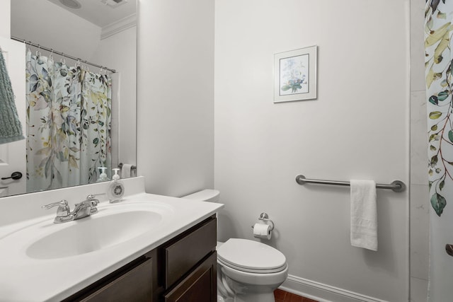 bathroom featuring vanity, ornamental molding, toilet, and a shower with shower curtain