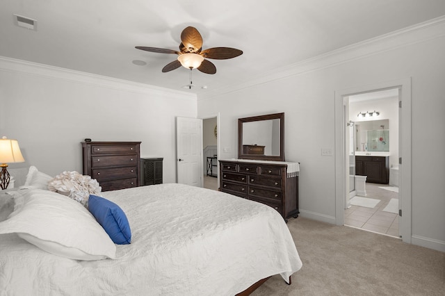 bedroom with crown molding, ceiling fan, connected bathroom, and light colored carpet