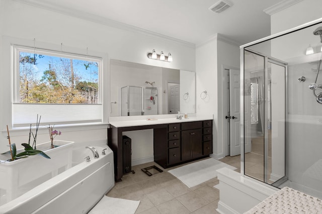 bathroom featuring vanity, tile patterned flooring, ornamental molding, and separate shower and tub