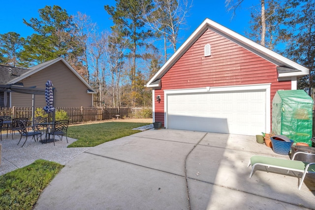 garage featuring a yard