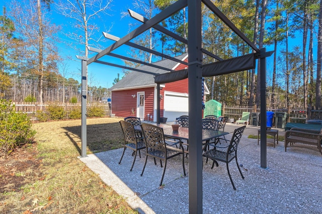 view of patio with a pergola and an outdoor structure