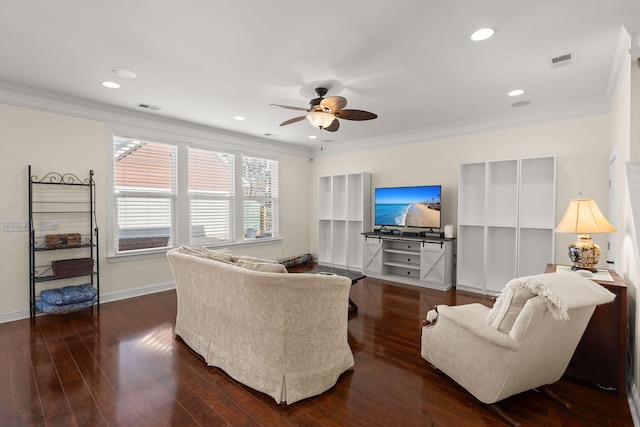 living room with dark hardwood / wood-style flooring, crown molding, and ceiling fan