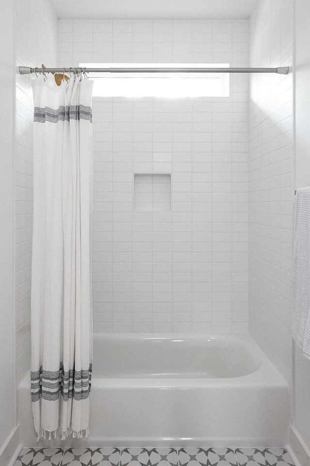 full bathroom with shower / bathtub combination with curtain