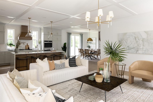 living area with a wealth of natural light and coffered ceiling