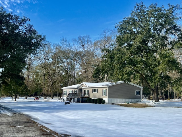 view of front of house featuring a wooden deck