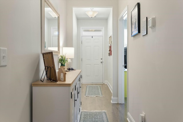 doorway featuring light hardwood / wood-style flooring