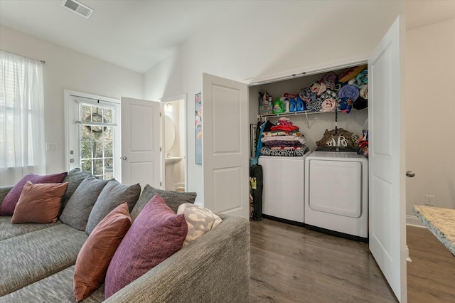 laundry room featuring hardwood / wood-style floors and independent washer and dryer